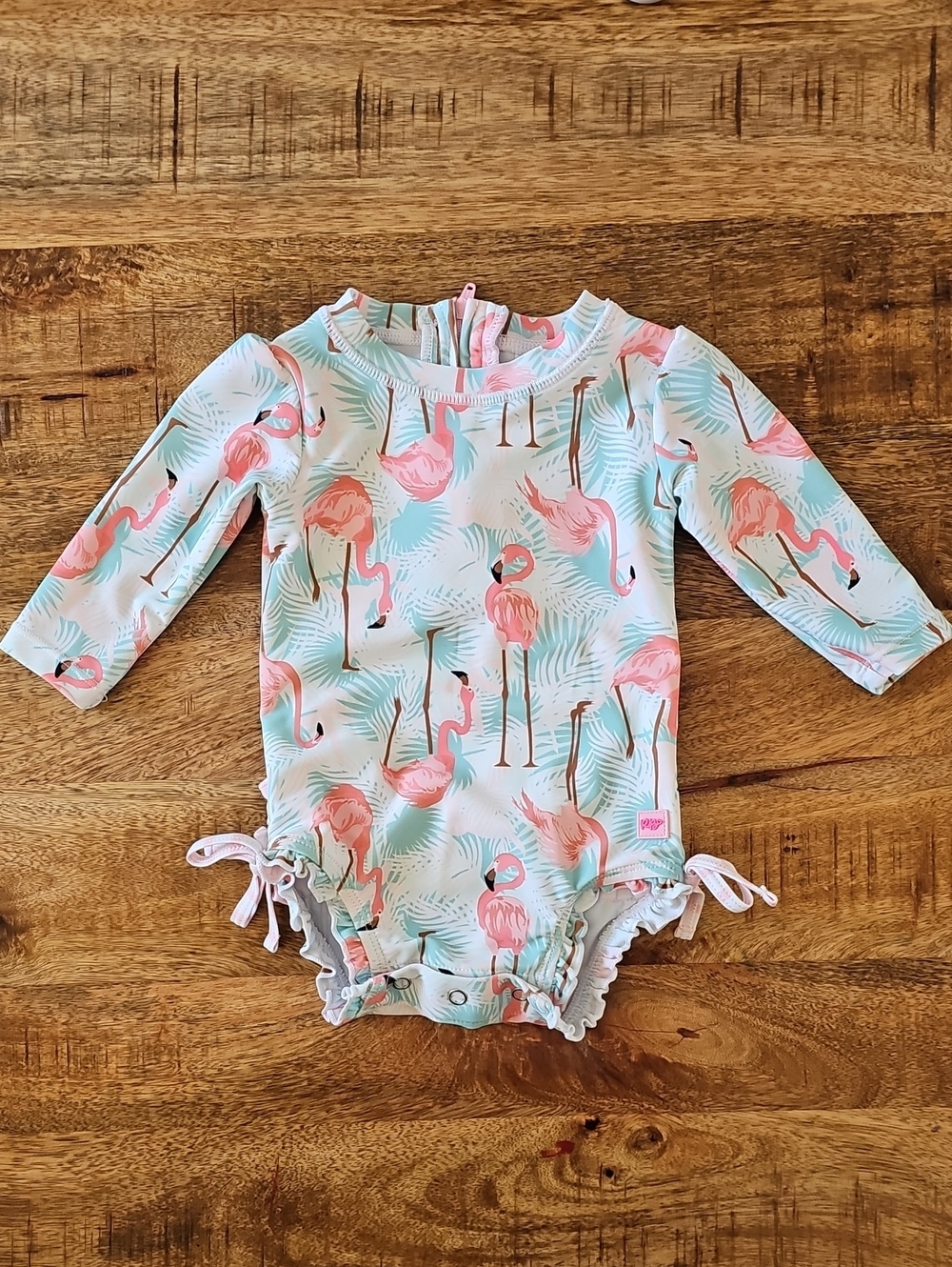 RuffleButts "Vibrant Flamingo" Long Sleeve One Piece Rash Guard Swimsuit